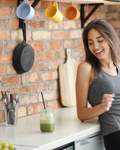 Lovely woman with delicious smoothie